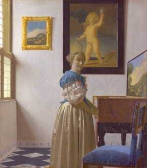 Johannes Vermeer Lady Standing at a Virginal 1